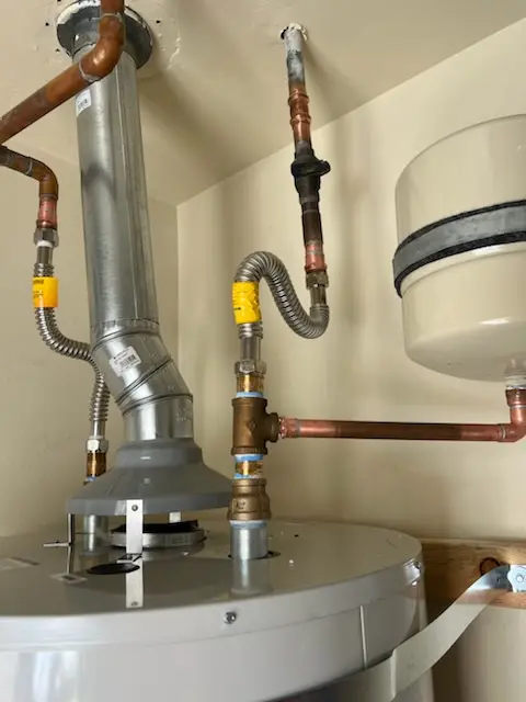 Water heater installation and plumbing repair in Tichigan